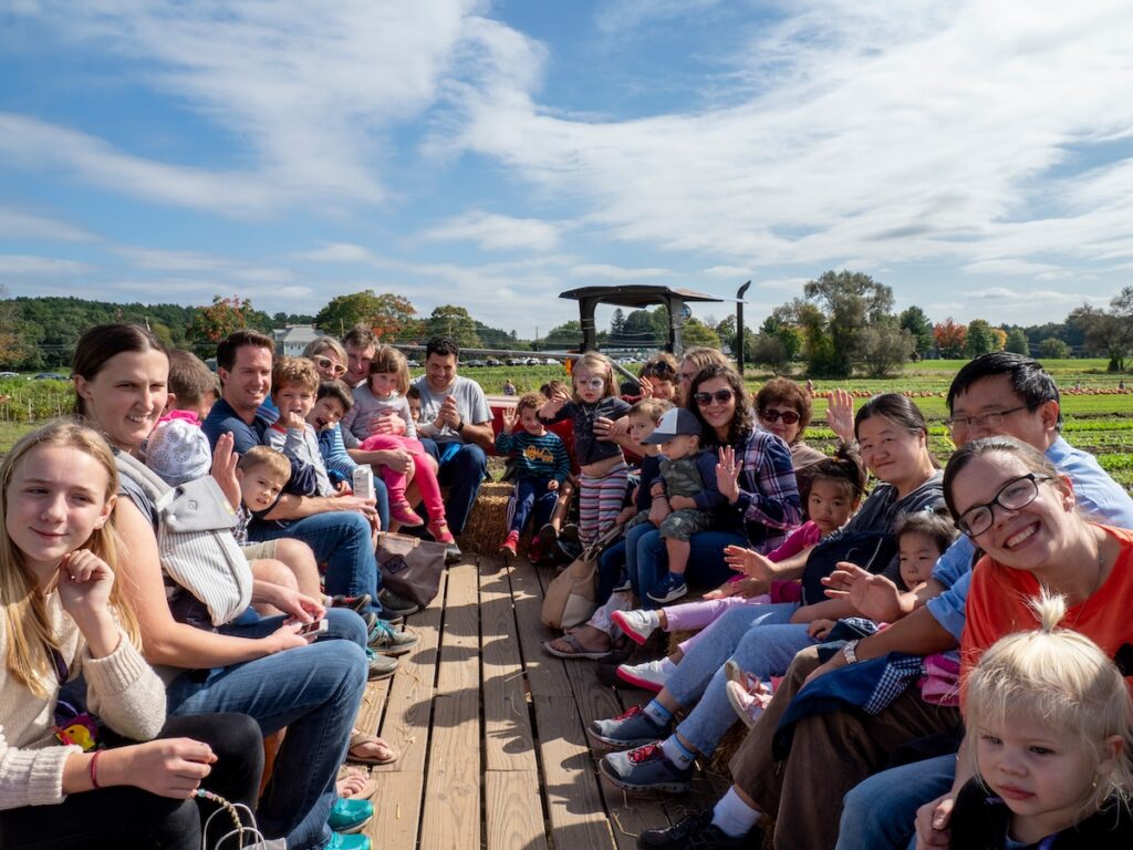 Enjoying a hay ride at the Verrill Farm Harvest Festival. Join in the family fun on October 11 to benefit pediatric care at Emerson Health.