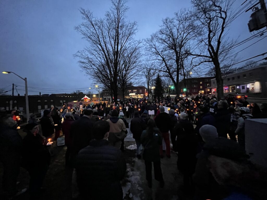 An estimated 250 people gathered in Memorial Park