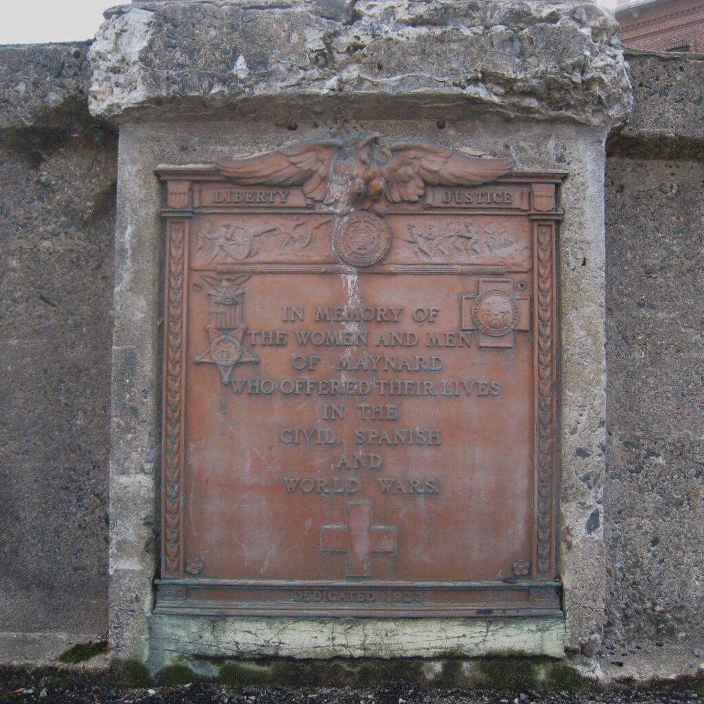 Plaque on the Main Street bridge. This plaque and one for the Walnut Street bridge were installed on Armistice Day, November 11, 1923, in memory of those who served in the named wars
