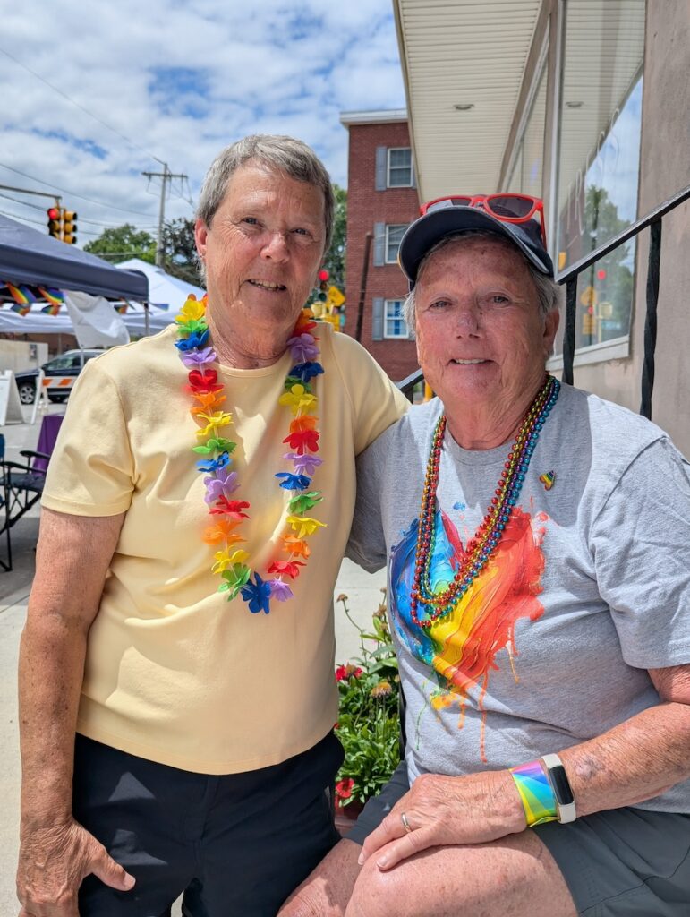 Peg Brown and Deb Roussell enjoying the Pride Festival