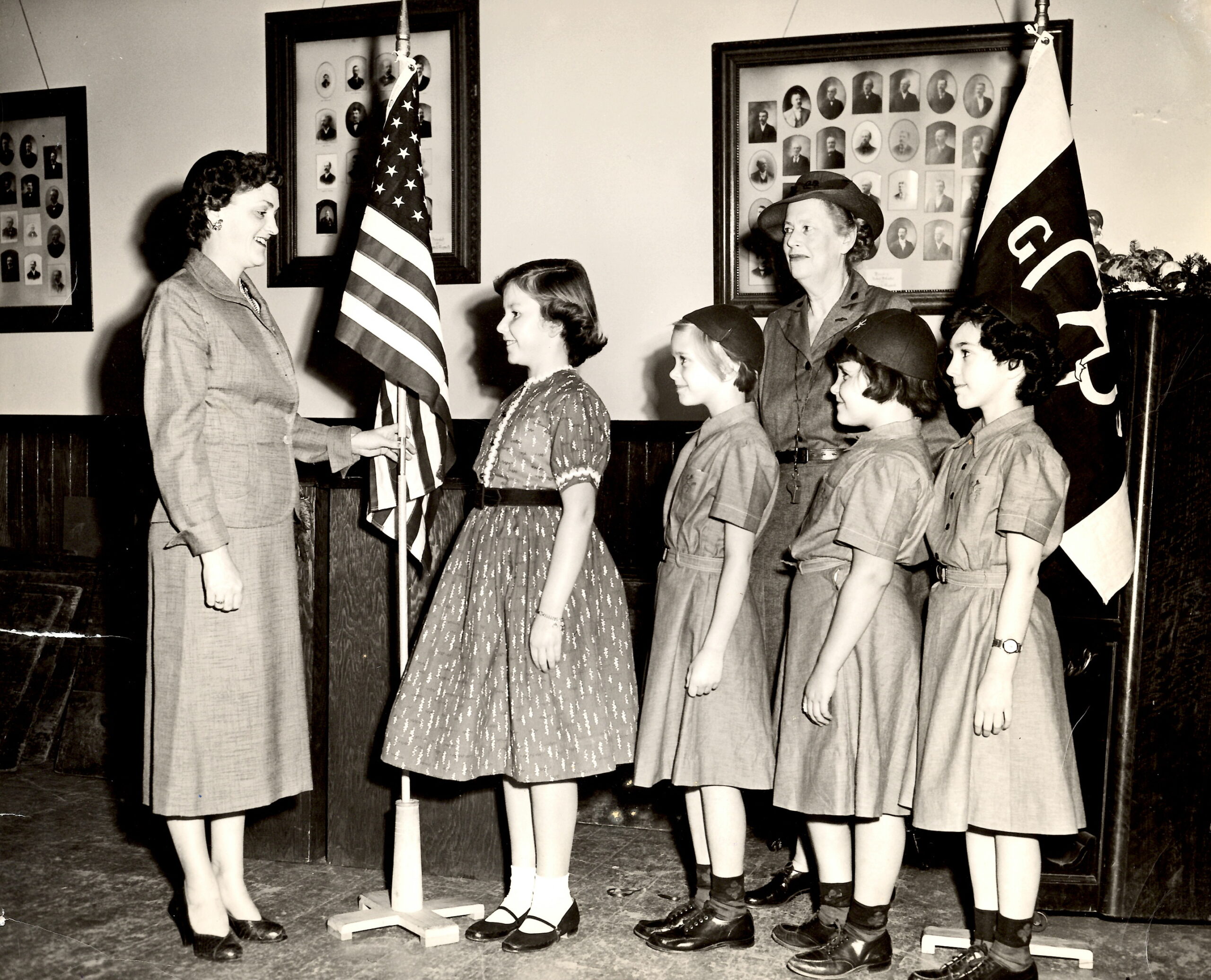 Warren was active in Maynard's Girl Scout organization and was the founder of a Brownie Troop. In this circa 1960 photo she is on the right (Maynard Historical Society archive)